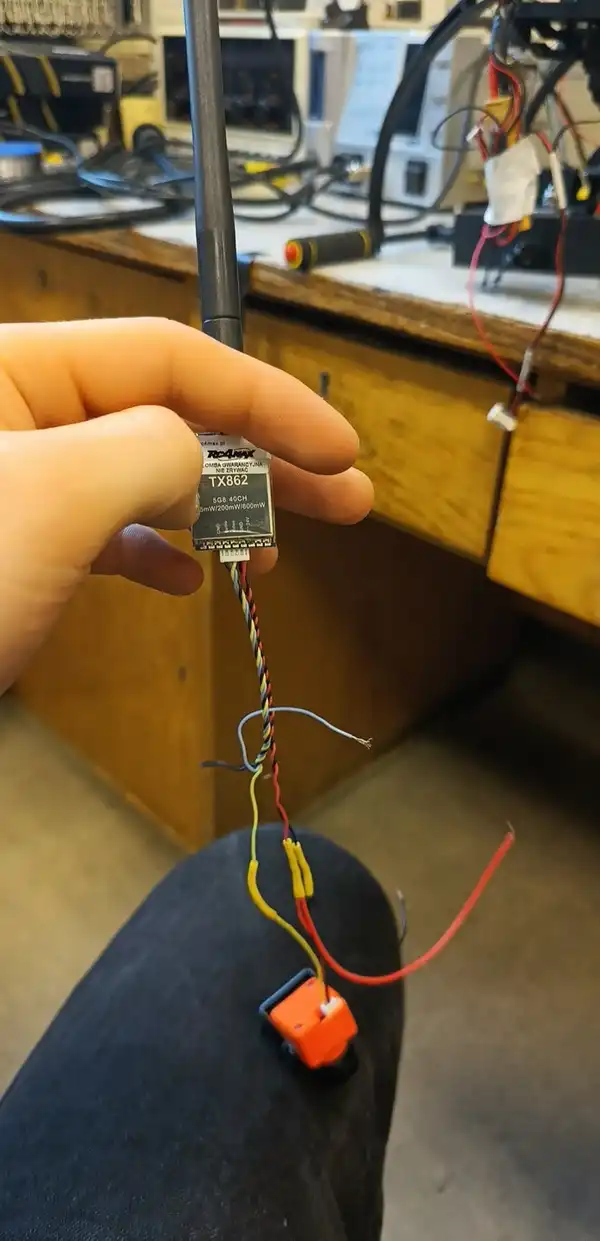 Connecting antena to the camera for a drone.