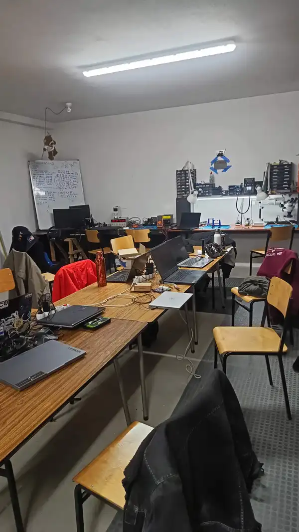 Inside an 'AGH Racing' electric workshop.